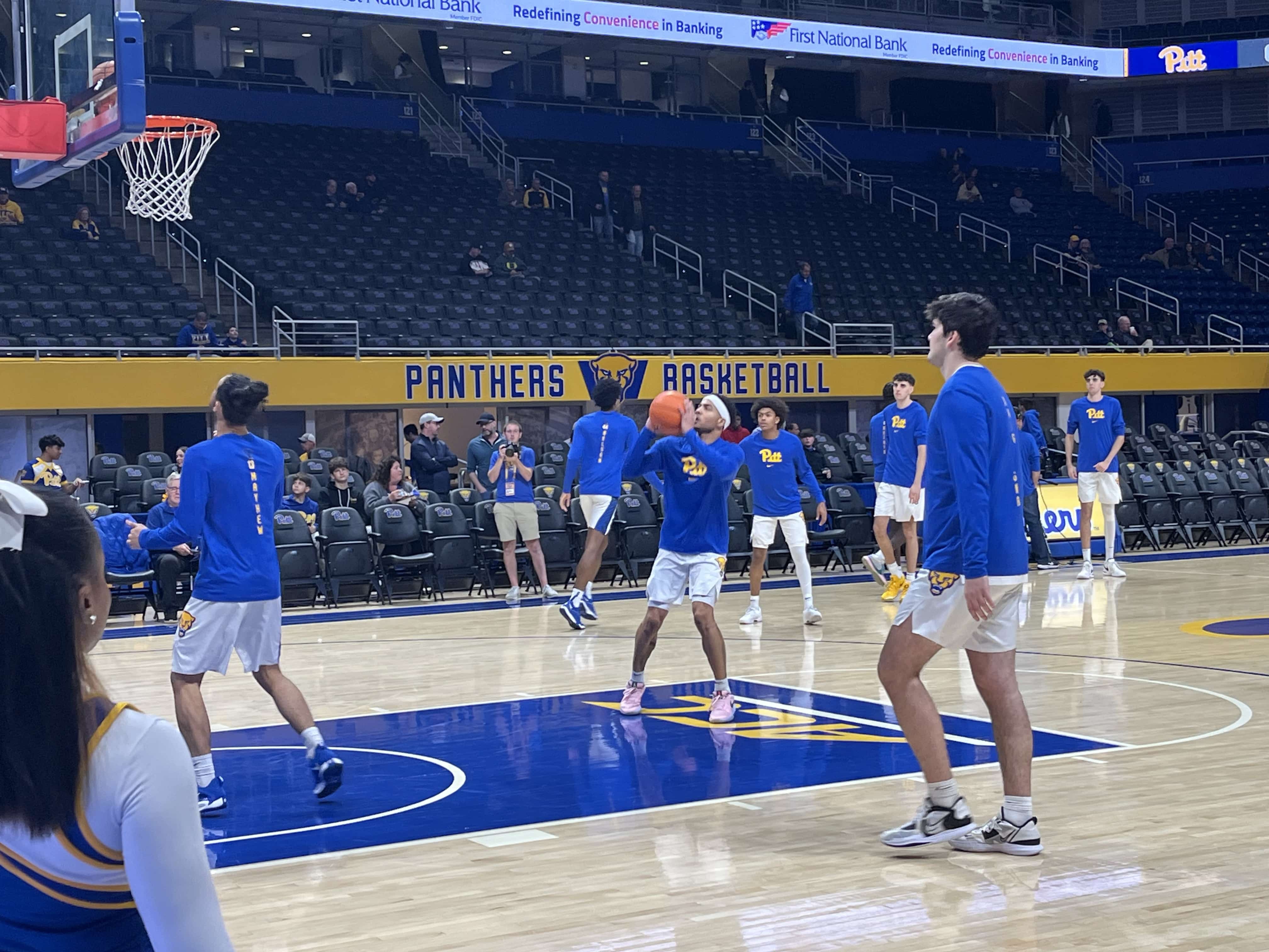 Pitt basketball star Ishmael Leggett shooting a mid-range jumper in warm-ups.