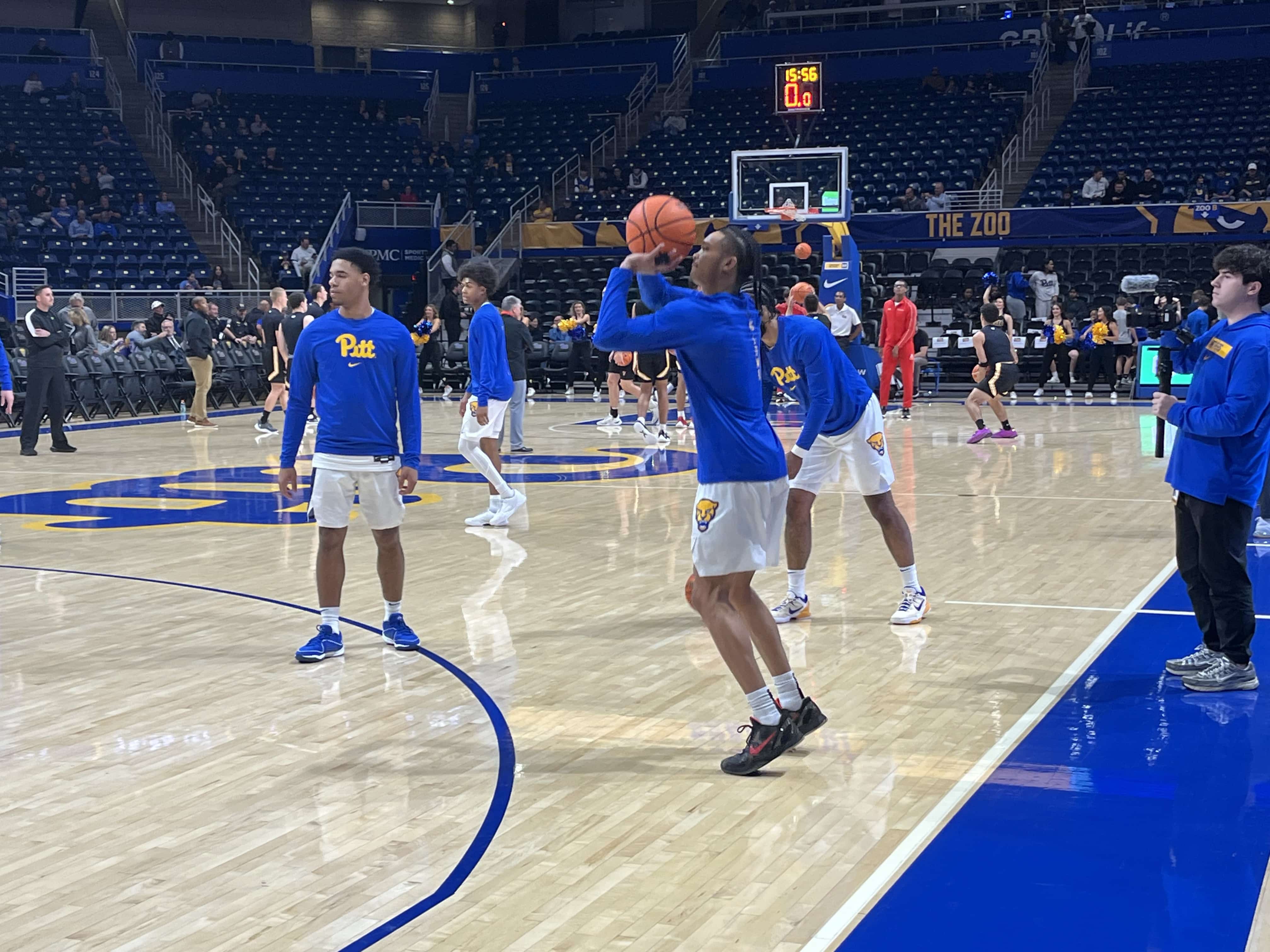 Pitt basketball player Jaland Lowe hits a three-pointer in warmups at the Petersen Events Center.