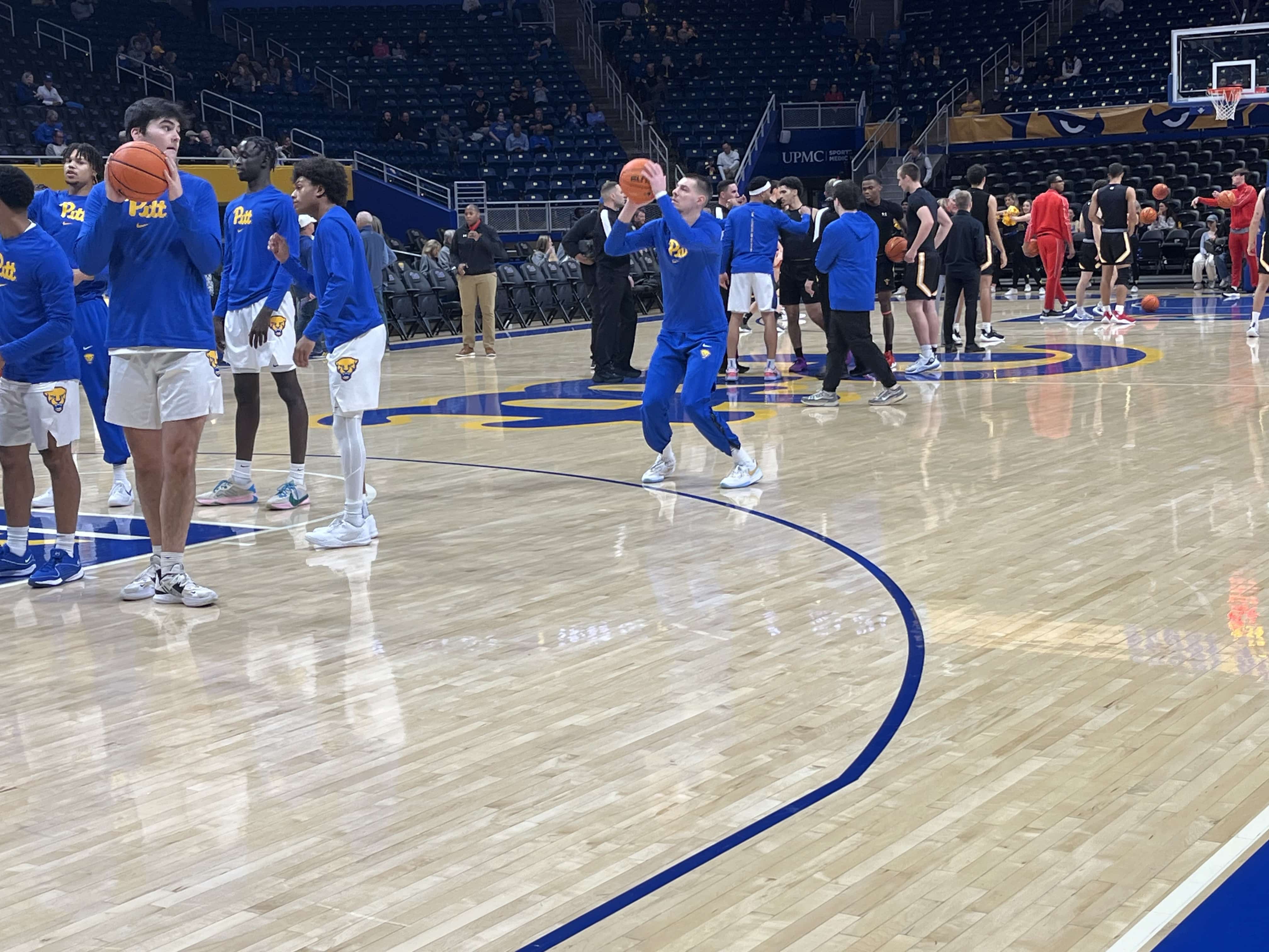 Pitt basketball player Amsal Delalic warms up his three-point shooting at the Petersen Events Center.
