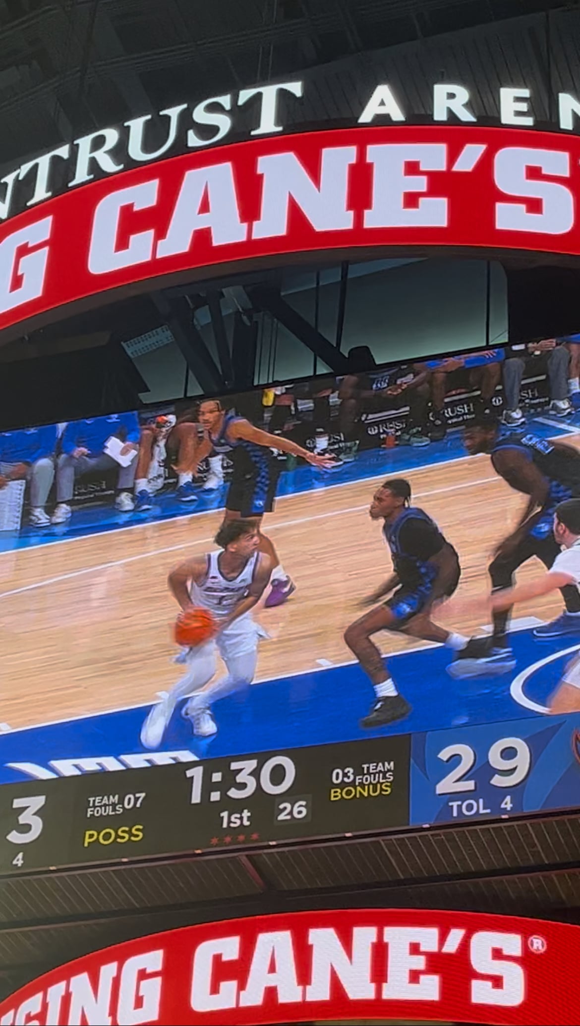 DePaul basketball guard Isaiah Rivera (1) drives into the paint before taking a spin-around fadeaway for two points