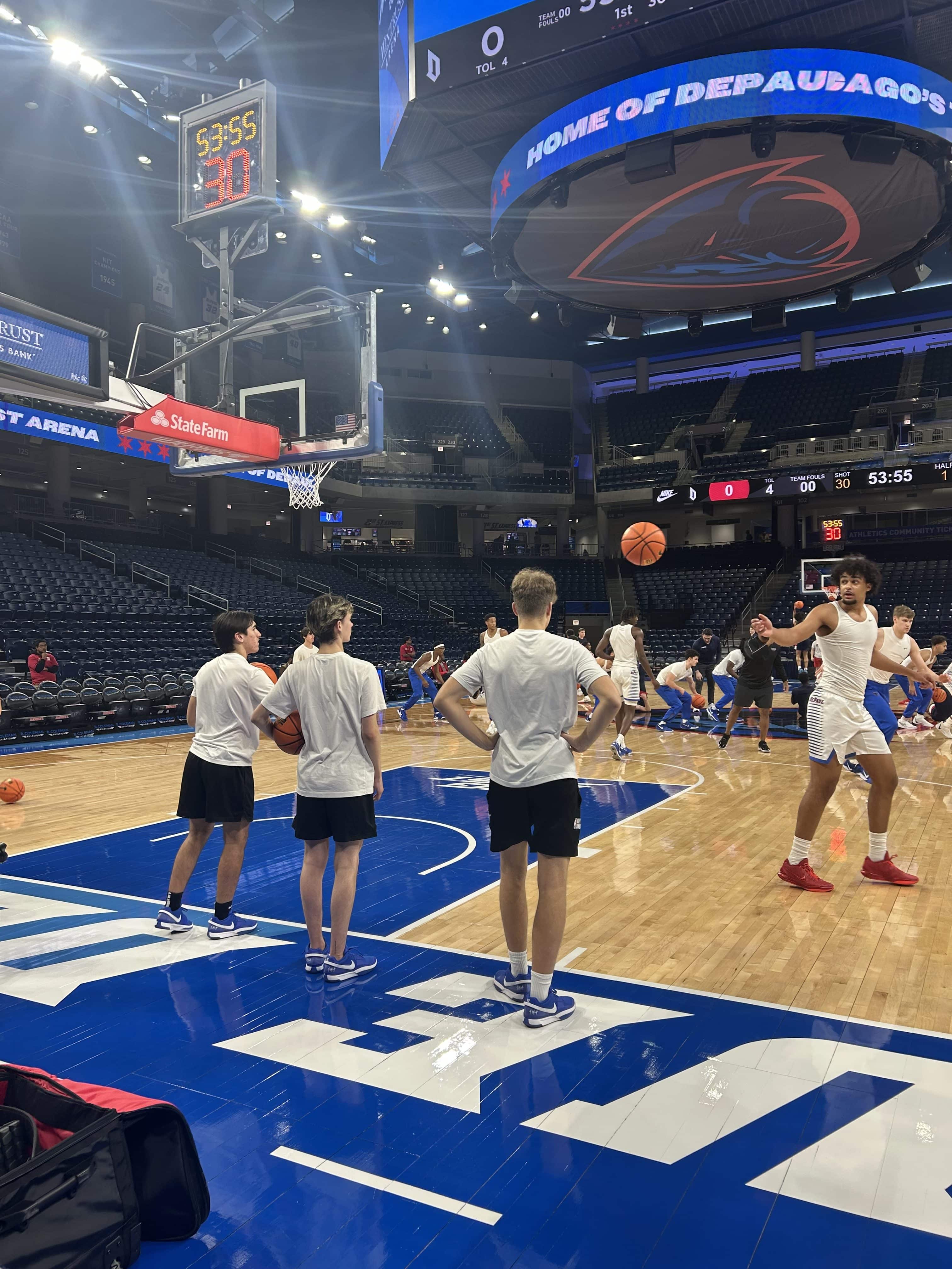 DePaul basketball players Théo Pierre-Justin, David Skogman warmup