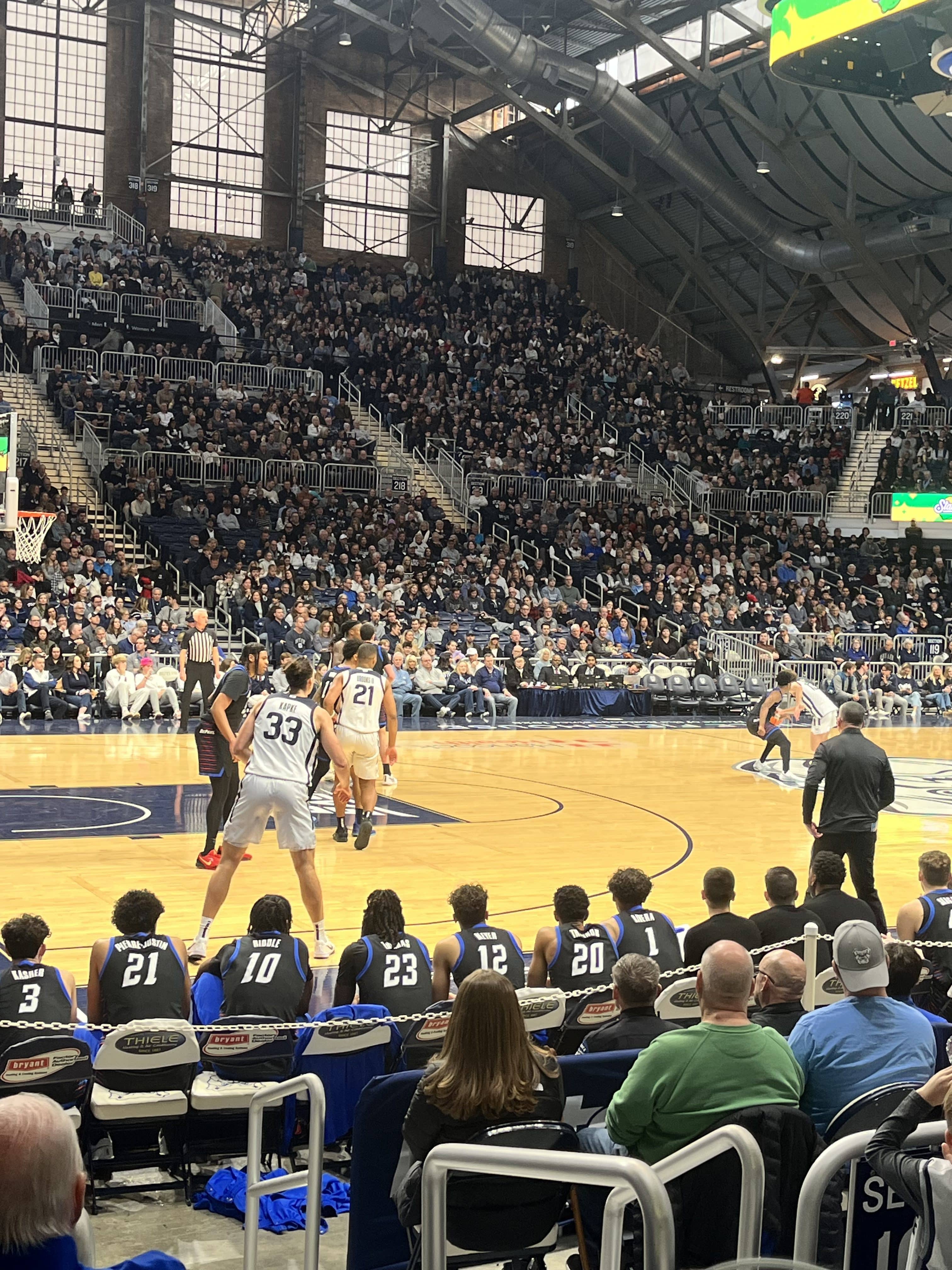 DePaul basketball player Layden Blocker defends against Finley Bizjack