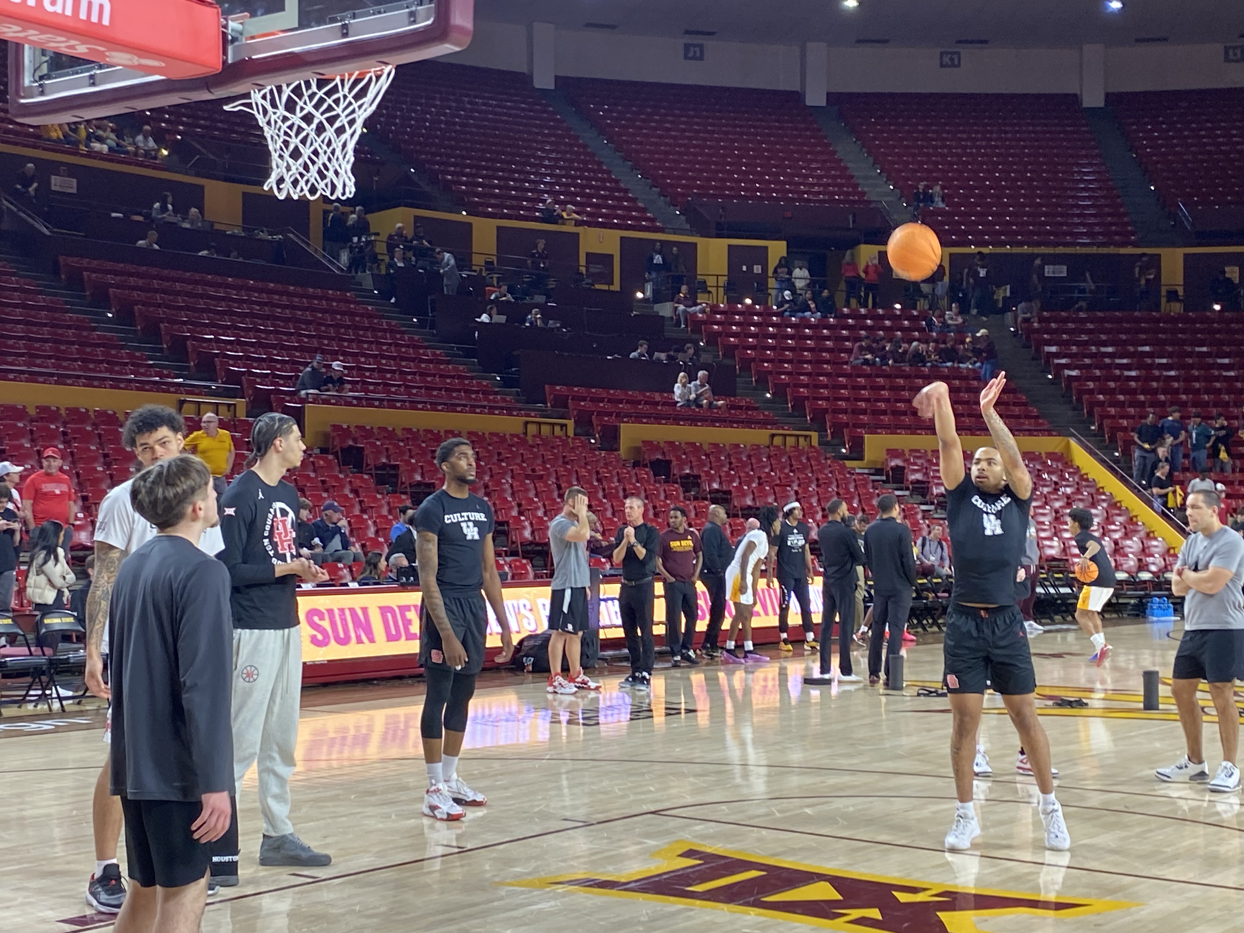 Houston basketball players warm up before their game against Arizona State (Photo Credit: Mihir Sinhasan, CBB Review)