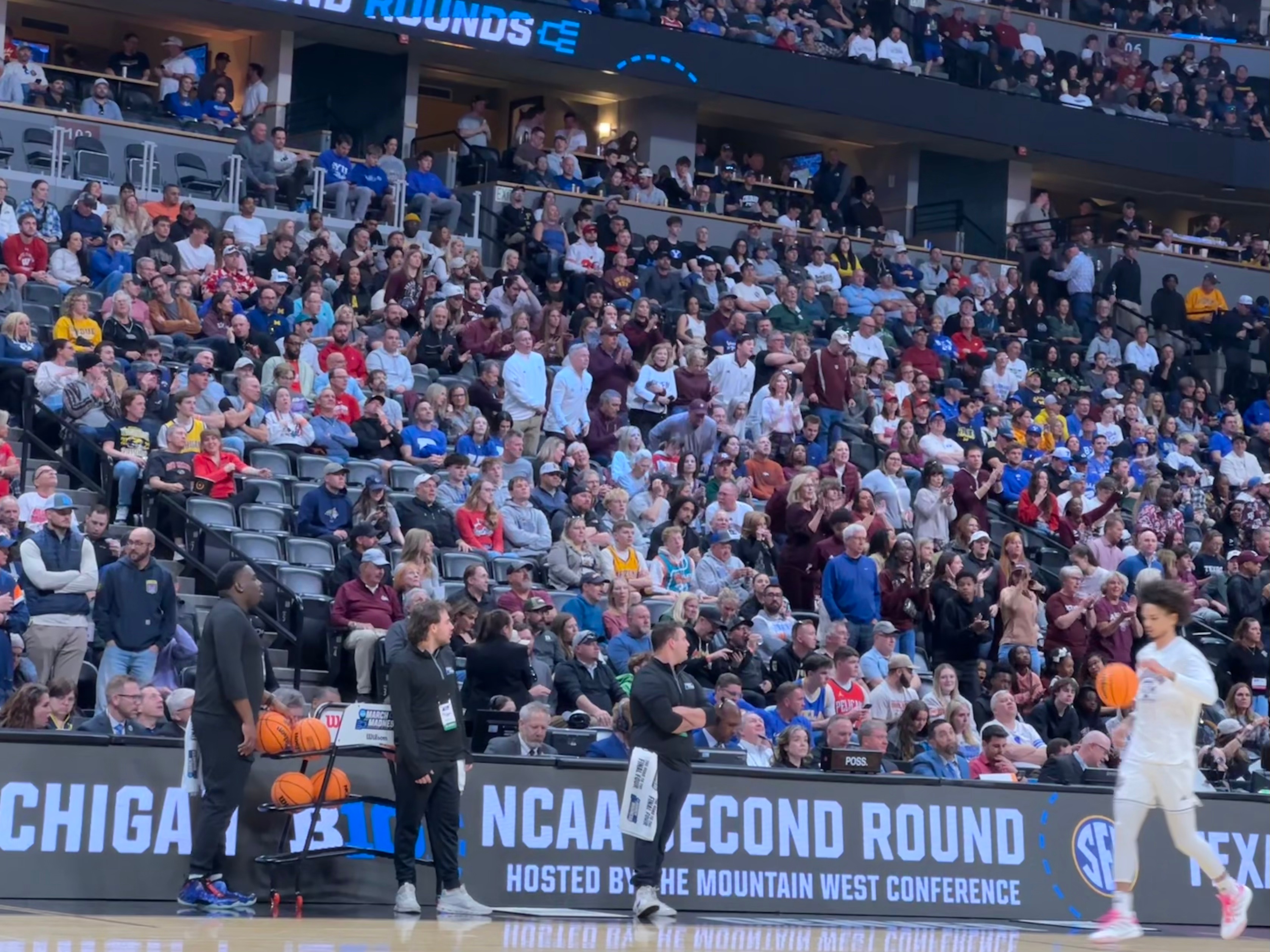 Texas A&M and Michigan take the court for pregame jump shots for a Round of 32 game at Ball Arena in Denver Colorado on March 22.
