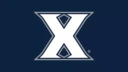 Xavier basketball logo on blue background