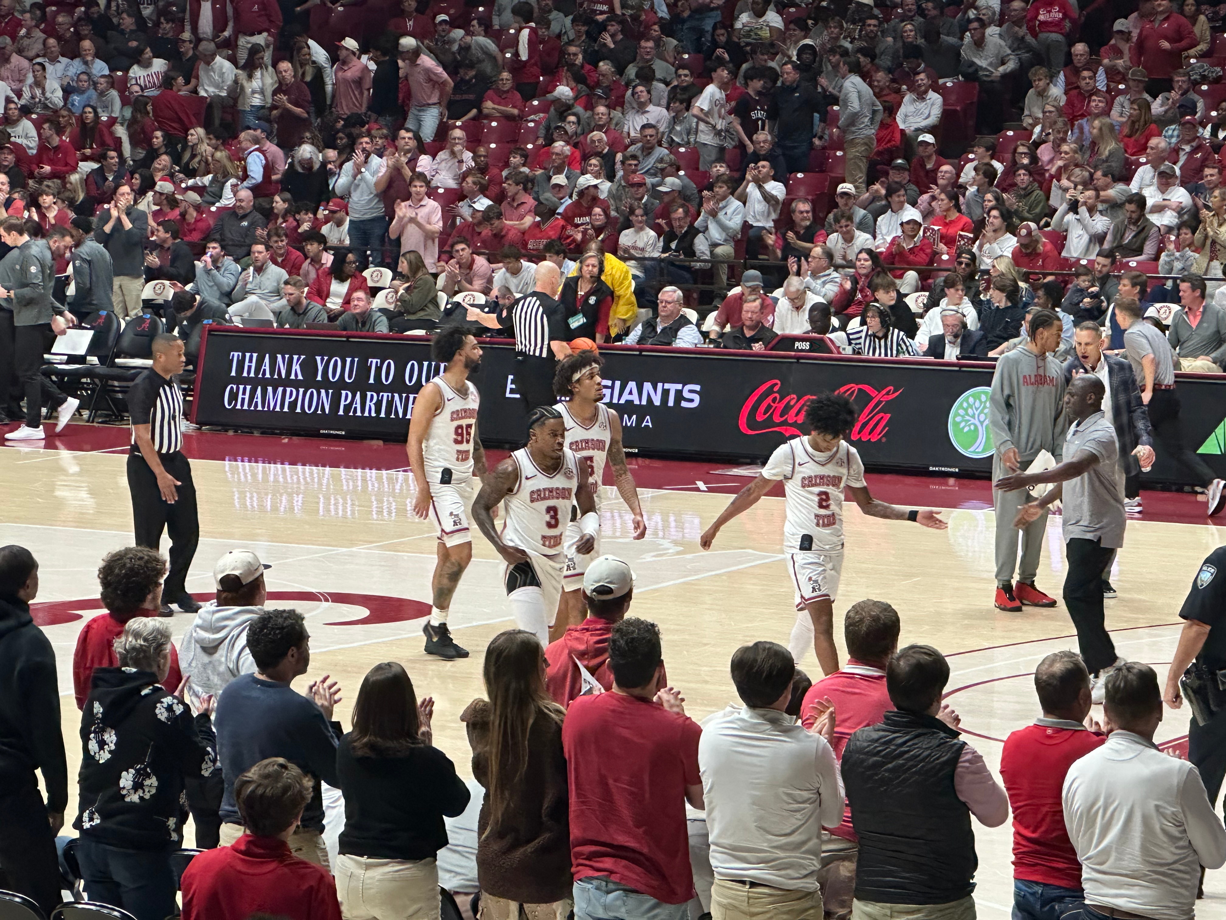 Alabama Basketball's Aden Holloway, Amari Allen, and Latrell Wrightsell Jr. all walking off the floor after dominant first half. (Photo Credit: Nicholas Elliott, CBB Review)